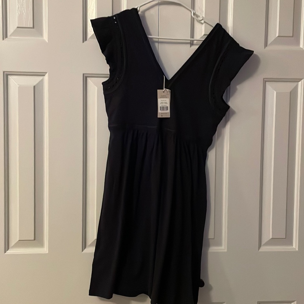 Dark blue boden dress with eyelet detail on sleeves. New with tags